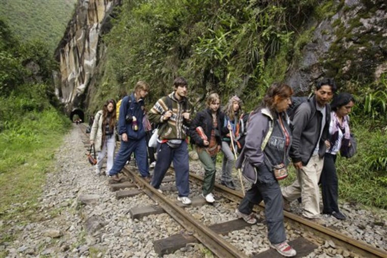Authorities said Machu Picchu will remain closed for weeks until the government can repair roads and railroad tracks washed out by mudslides and the raging Urubamba River. 